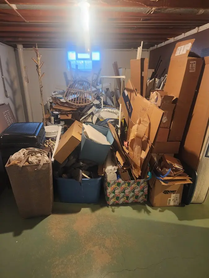 Roll-off dumpster container at job site for 4 Yard Dumpster Rental in Weaverville